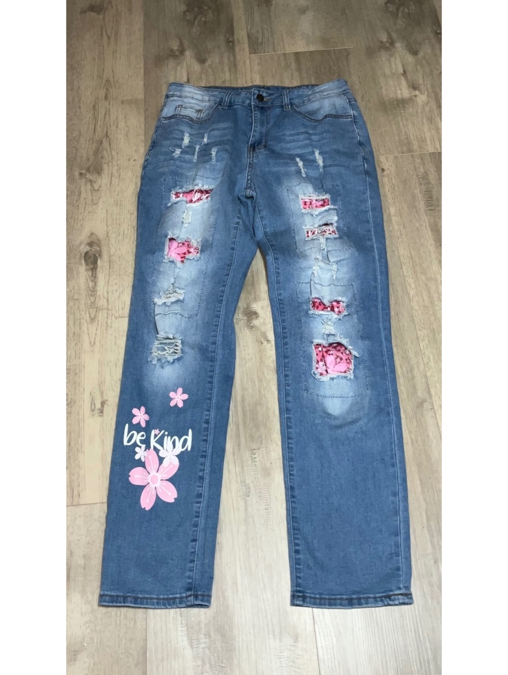 Medium Blue Distressed Denim Jeans with Pink Floral Patches and Be Kind Print